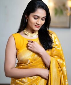 Mustard yellow Kanjivaram Banarasi soft silk saree with zari floral weave full body view